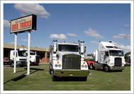 Used semi trucks on a dealer lot